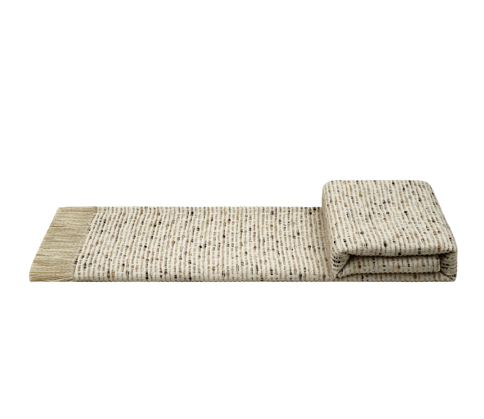 A folded woven throw blanket with fringe on one end, shown in a light beige color with small black speckles. 