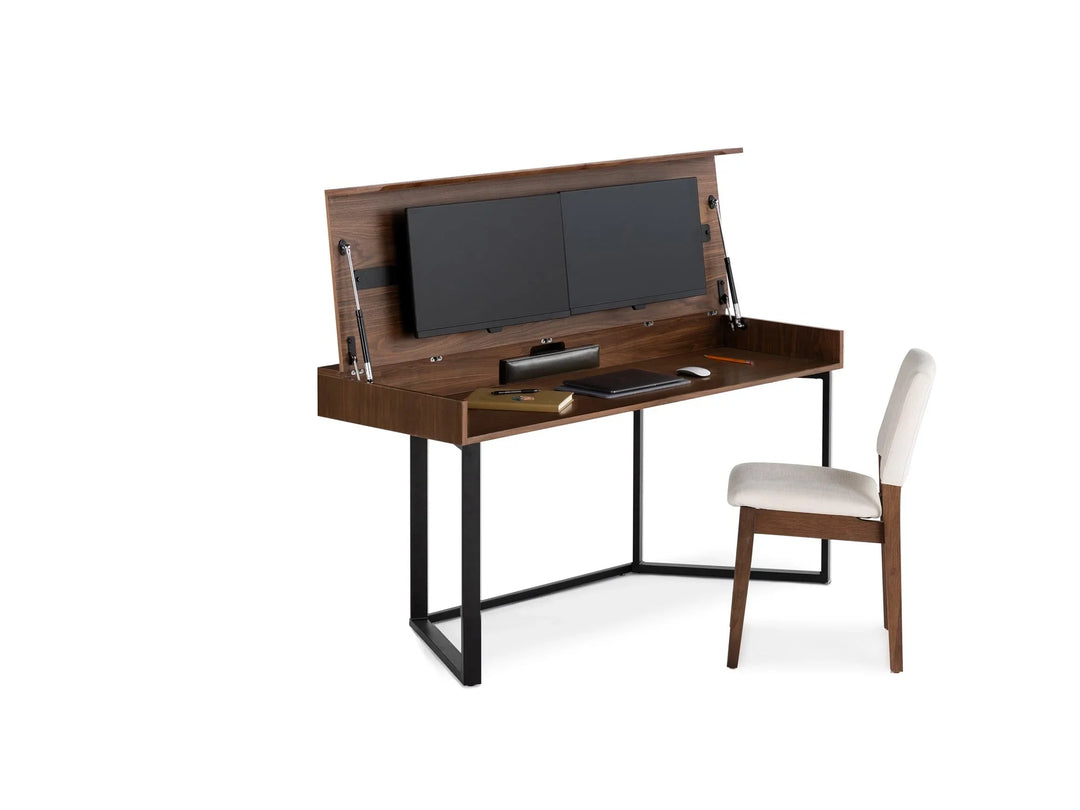 Wooden computer desk with two monitors, keyboard, and chair on a white background