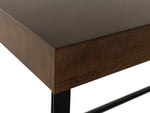 Close-up of a wooden side table with a dark brown finish and metal legs.