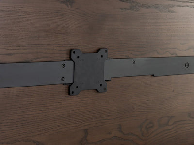 Metal hinge on a wooden surface