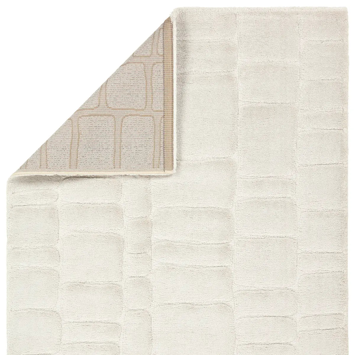 Textured beige rug with a subtle pattern on a white background