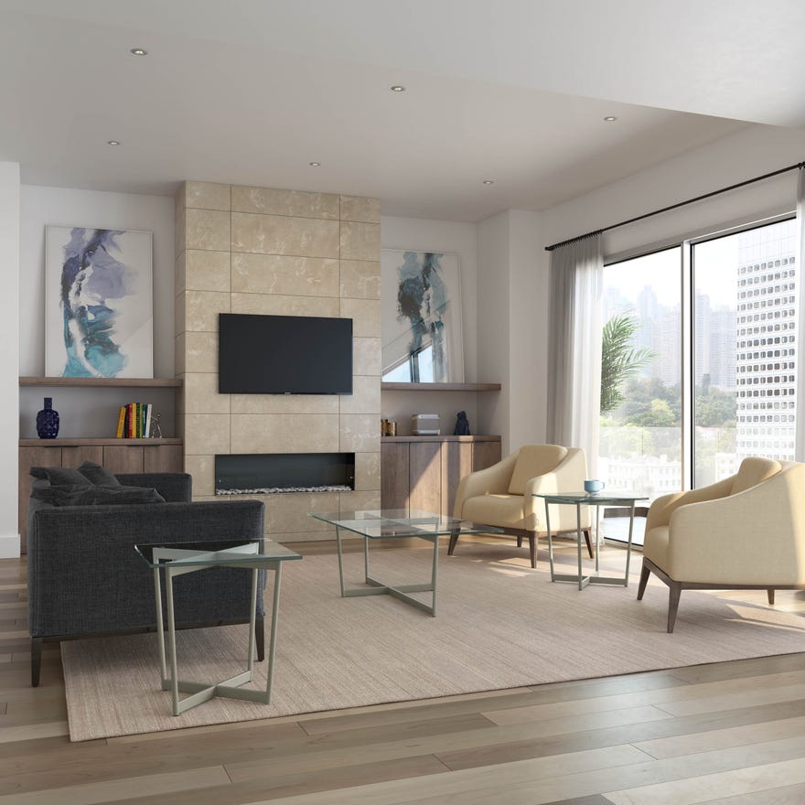 Modern living room with gray sofa, beige armchairs, and glass coffee table.