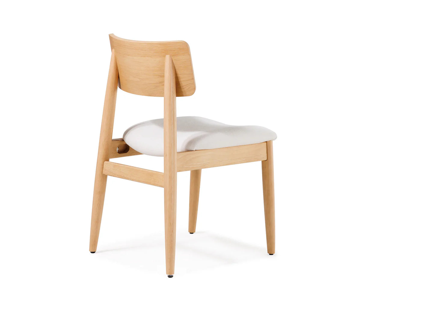 Wooden chair with a white cushion on a white background