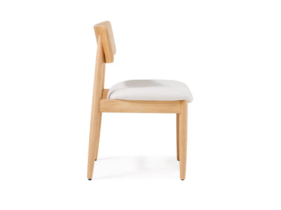 Wooden chair with a white cushion on a white background