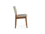 Chair with wooden legs and gray cushioned seat on a white background