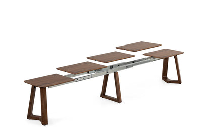 Wooden dining table with extendable design on a white background