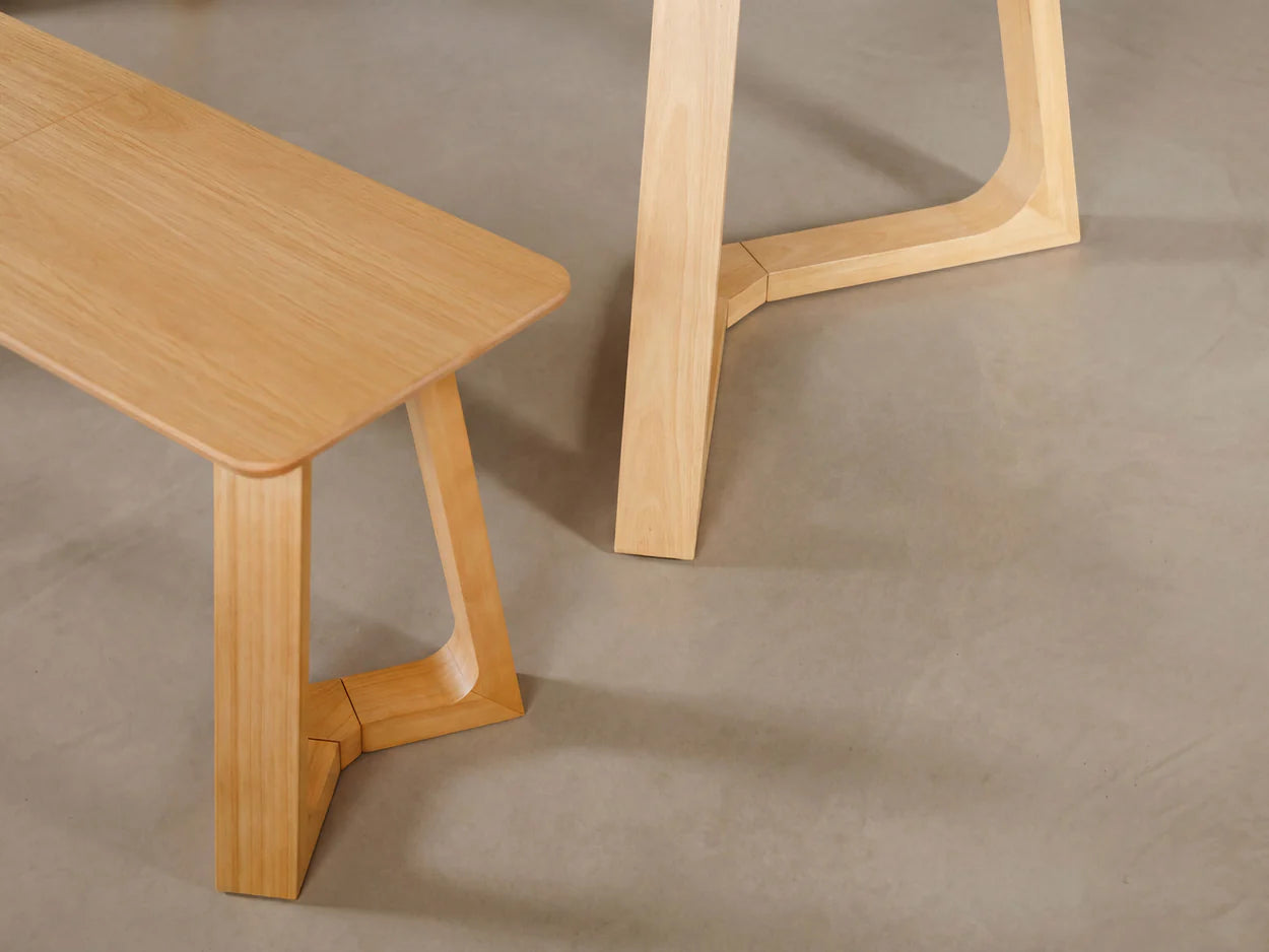 Wooden table and bench set on a concrete floor