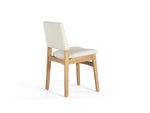 White chair with wooden legs on a white background