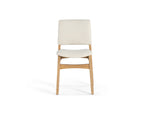 White chair with wooden legs on a white background
