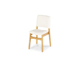 White chair with wooden legs on a white background