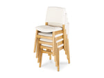 Stack of wooden chairs with white seats on a white background