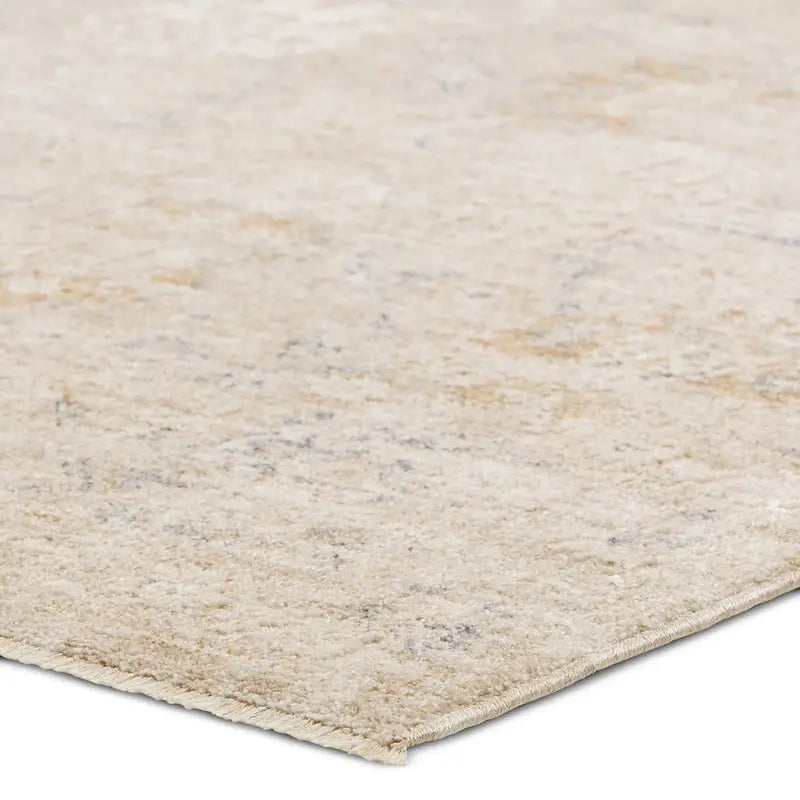 Close-up of a textured beige rug corner on a white background