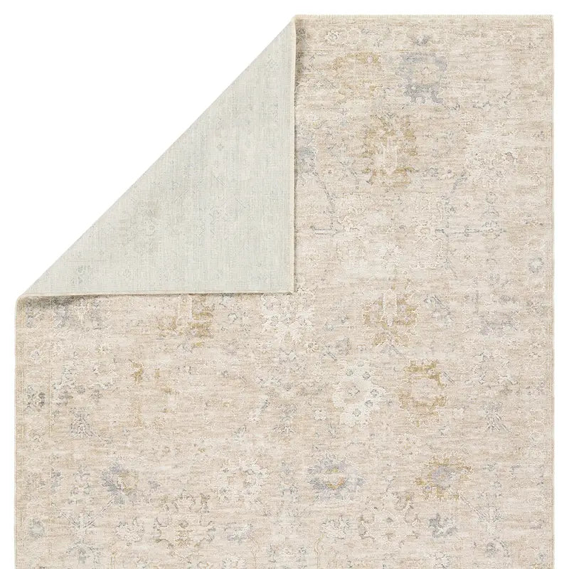 Textured rug with a neutral color palette on a white background