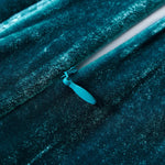 Teal razor on a textured teal background