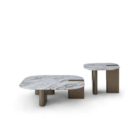 Two marble coffee tables with bronze legs on a white background