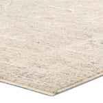 Close-up of a textured beige rug on a white background