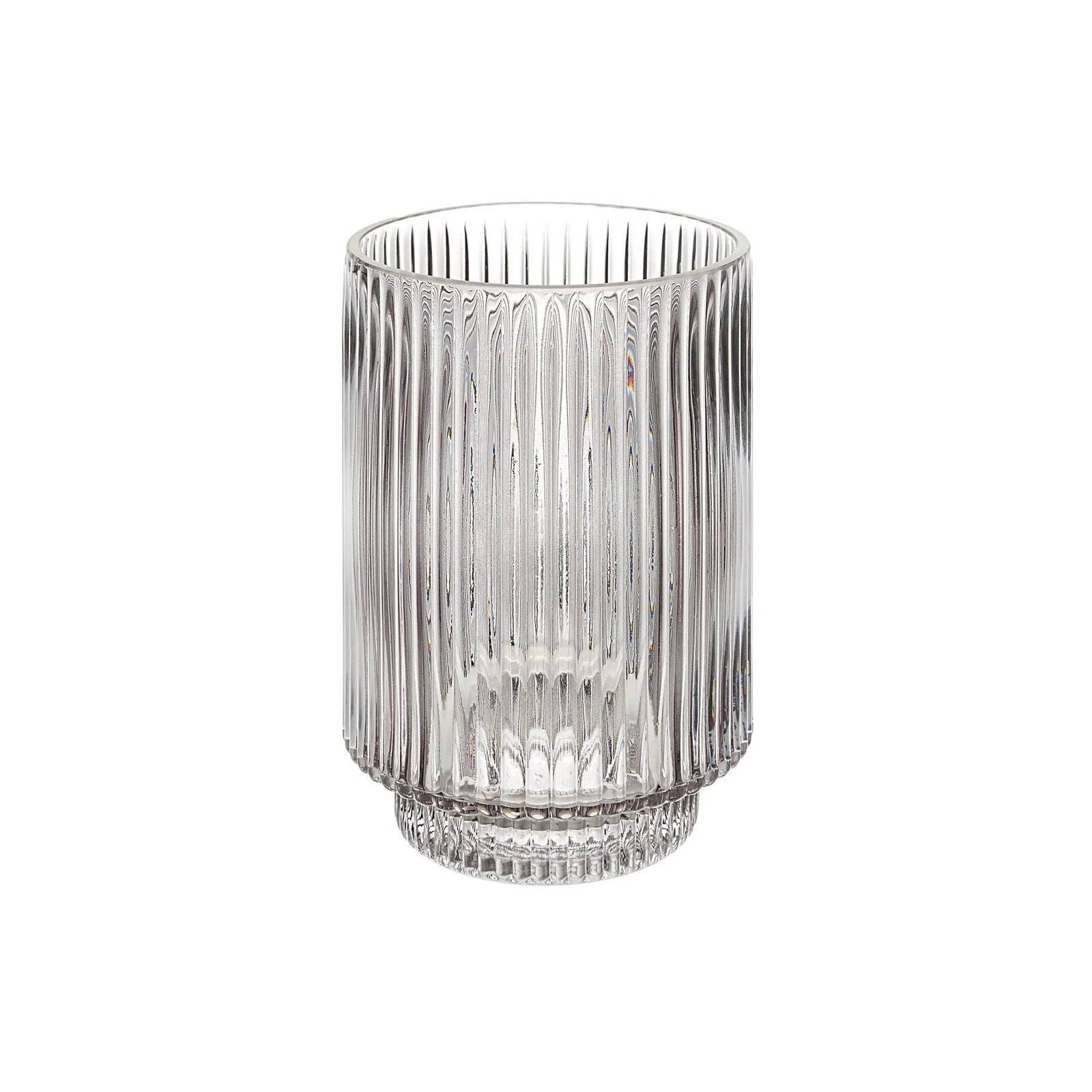 Clear glass vase with ribbed design on a white background