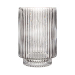 Clear glass vase with ribbed design on a white background