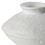 close up to a white ceramic Vito vase with an abstract and textured design.