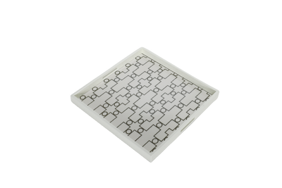 A white ivory serving tray with a geometric pattern.