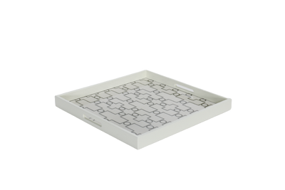 A white ivory serving tray with a geometric pattern.