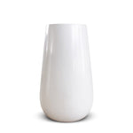 White tall planter made of fiberglass with a matte finish, designed for indoor use.