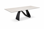 A contemporary extendable dining table with a white marble top and black base, shown in a fully extended state.