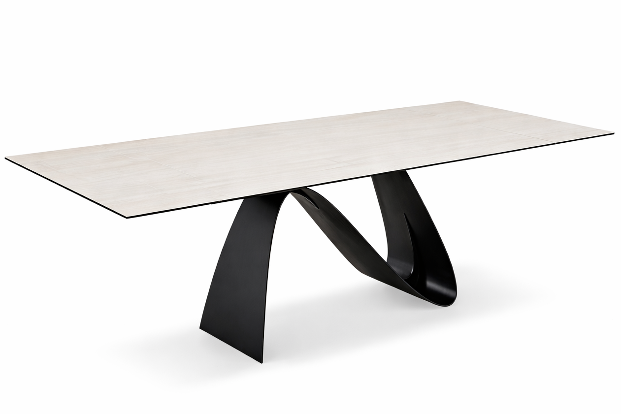 A contemporary extendable dining table with a white marble top and black base, shown in a fully extended state.