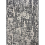 Textured gray and black patterned rug on a white background