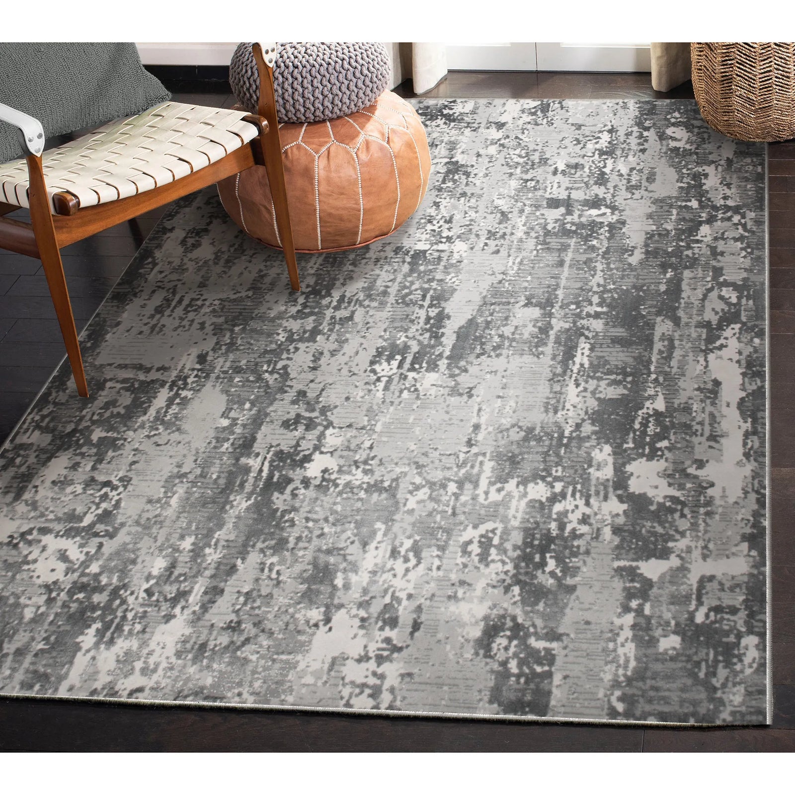 Gray patterned rug in a room with furniture