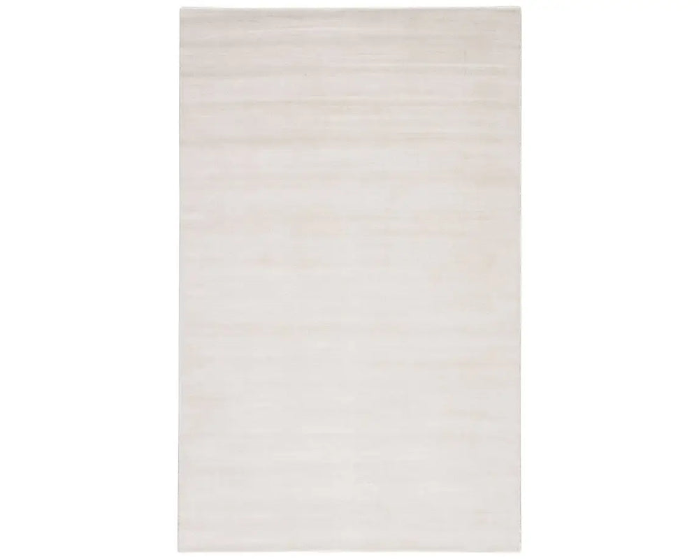 A white, solid color area rug on a plain background.