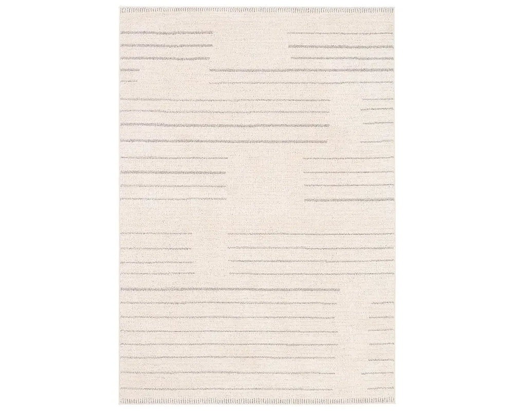 A rectangular beige area rug with a simple geometric pattern and power loomed construction.