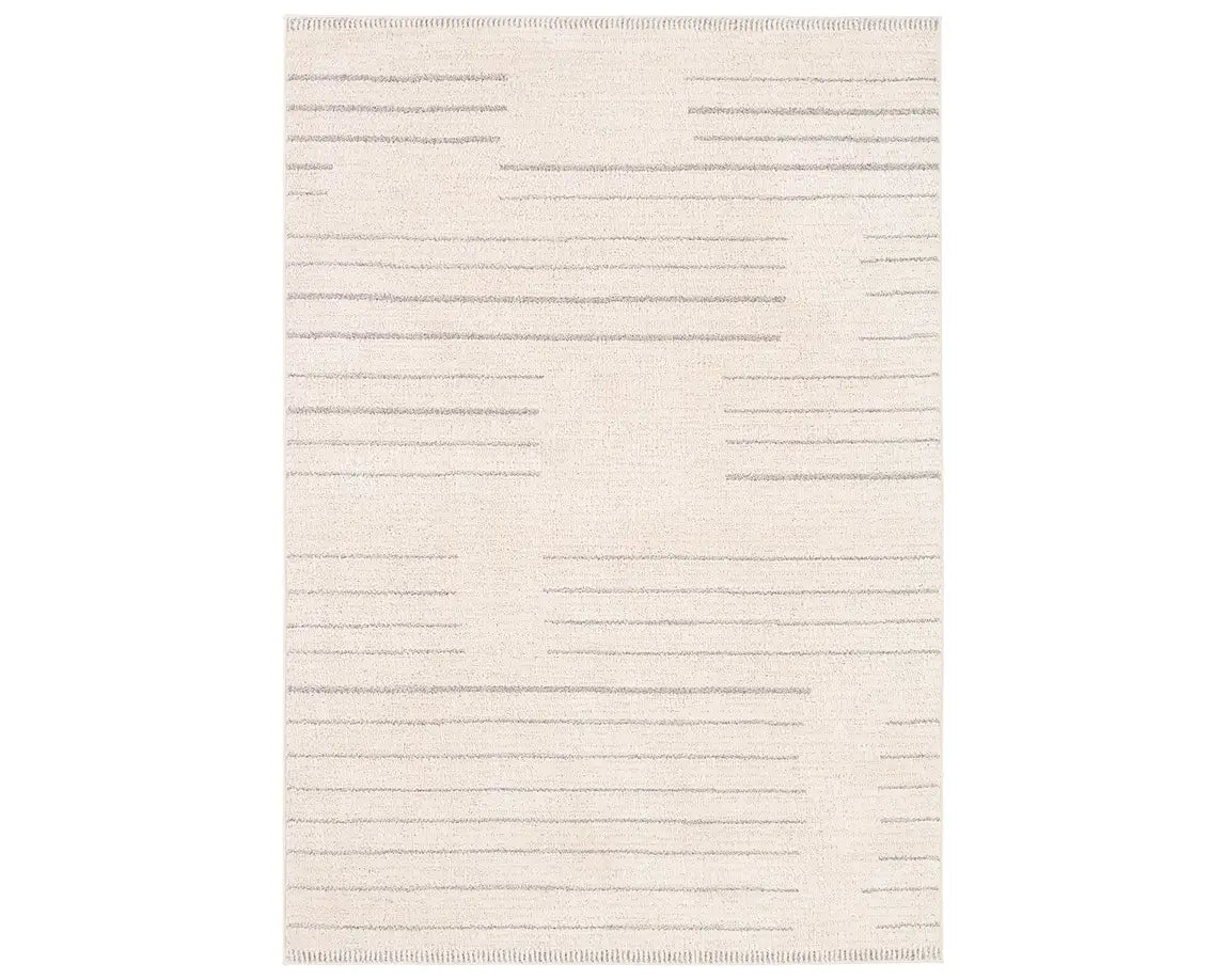 A rectangular beige area rug with a simple geometric pattern and power loomed construction.