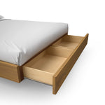 Queen size storage bed frame with a wooden headboard and a drawer in the footboard, presented in a clear finish.