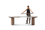 Woman holding a modern dining table on a white background
