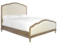 Bed with wooden frame and upholstered headboard on a white background