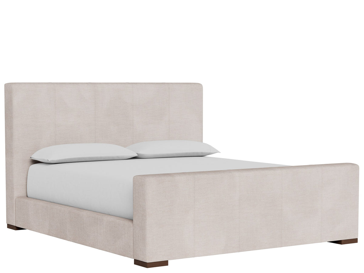 A modern platform bed with a tall upholstered headboard and footboard in a light blush pink fabric, shown with white bedding and two pillows against a plain white background.