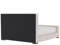 An upholstered bed frame with a large dark charcoal side panel and light beige fabric sides and footboard, shown with a white mattress on a plain white background.