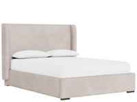 An upholstered bed frame in a light beige fabric, shown with a white mattress and two white pillows against a solid white background.