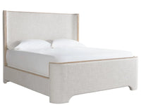 Beige upholstered bed with white bedding on a white background