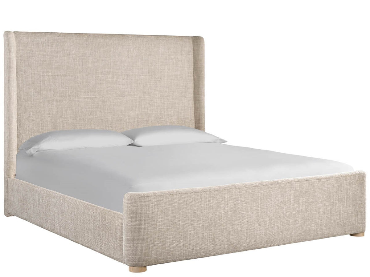 Beige upholstered bed with white bedding on a white background