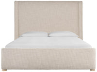 An upholstered bed frame with a tall wingback headboard and matching footboard in a light beige textured fabric, shown with white bedding and two white pillows against a plain white background.