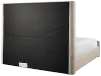 Bed with black upholstered headboard and beige sides on a white background