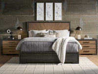 Bedroom with wooden bed, nightstands, and wall art in a modern setting.