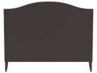 A dark brown upholstered headboard with a curved top and small wooden legs, shown against a plain white background.