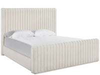 Beige upholstered bed with white bedding on a white background