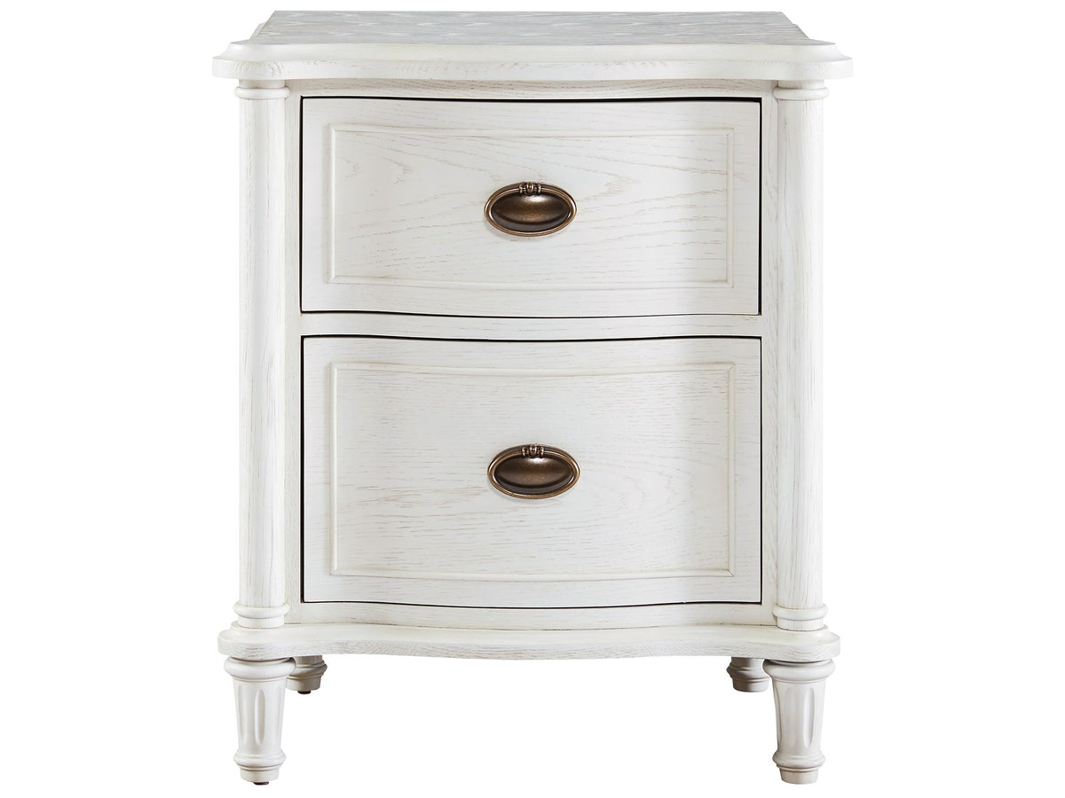 White nightstand with two drawers and brass handles on a white background