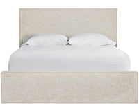 Beige upholstered bed with white bedding on a white background