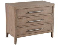 Wooden dresser with three drawers and metal handles on a white background