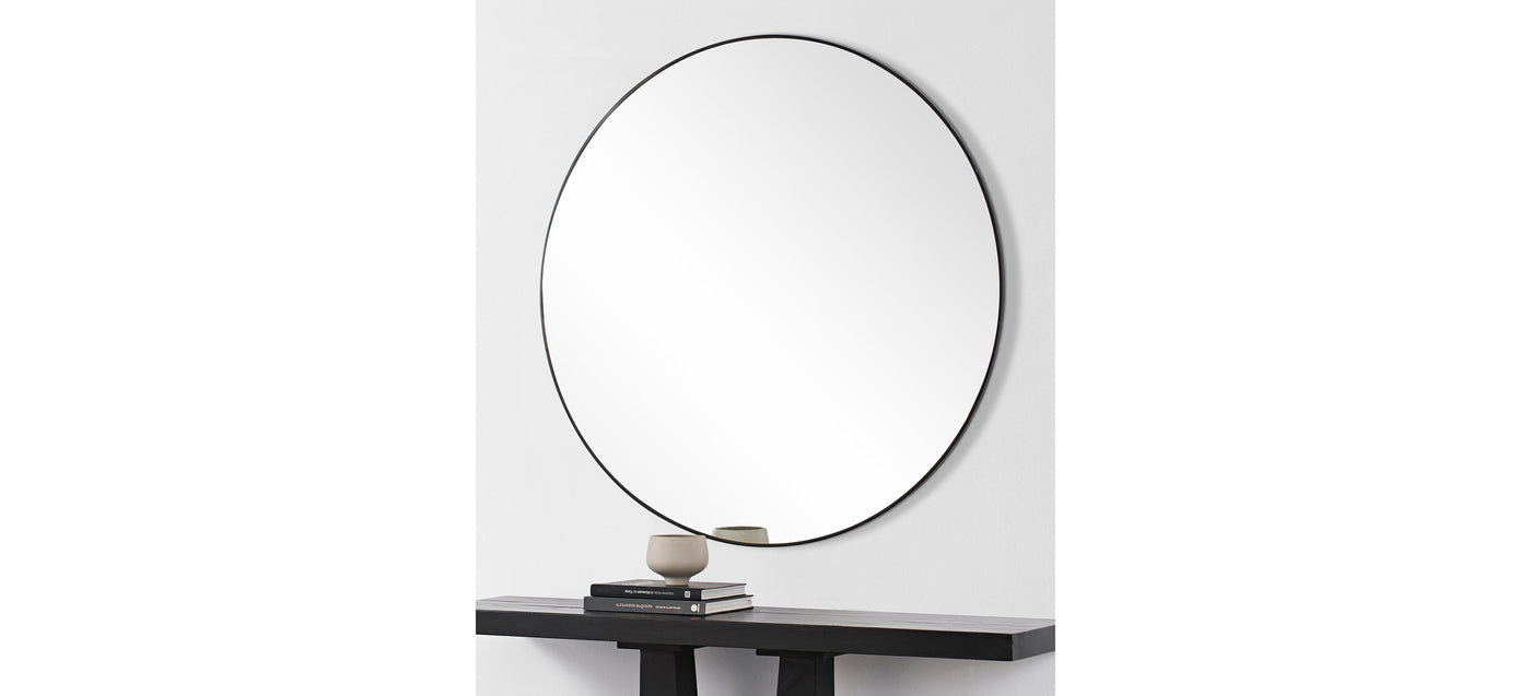 Side look of a mirror with black frame on a white background
